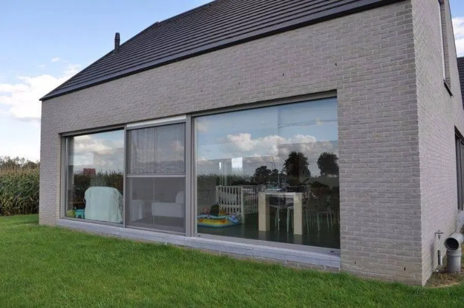 Châssis triple vitrage posés — réalisation châssis par Châssis Jette