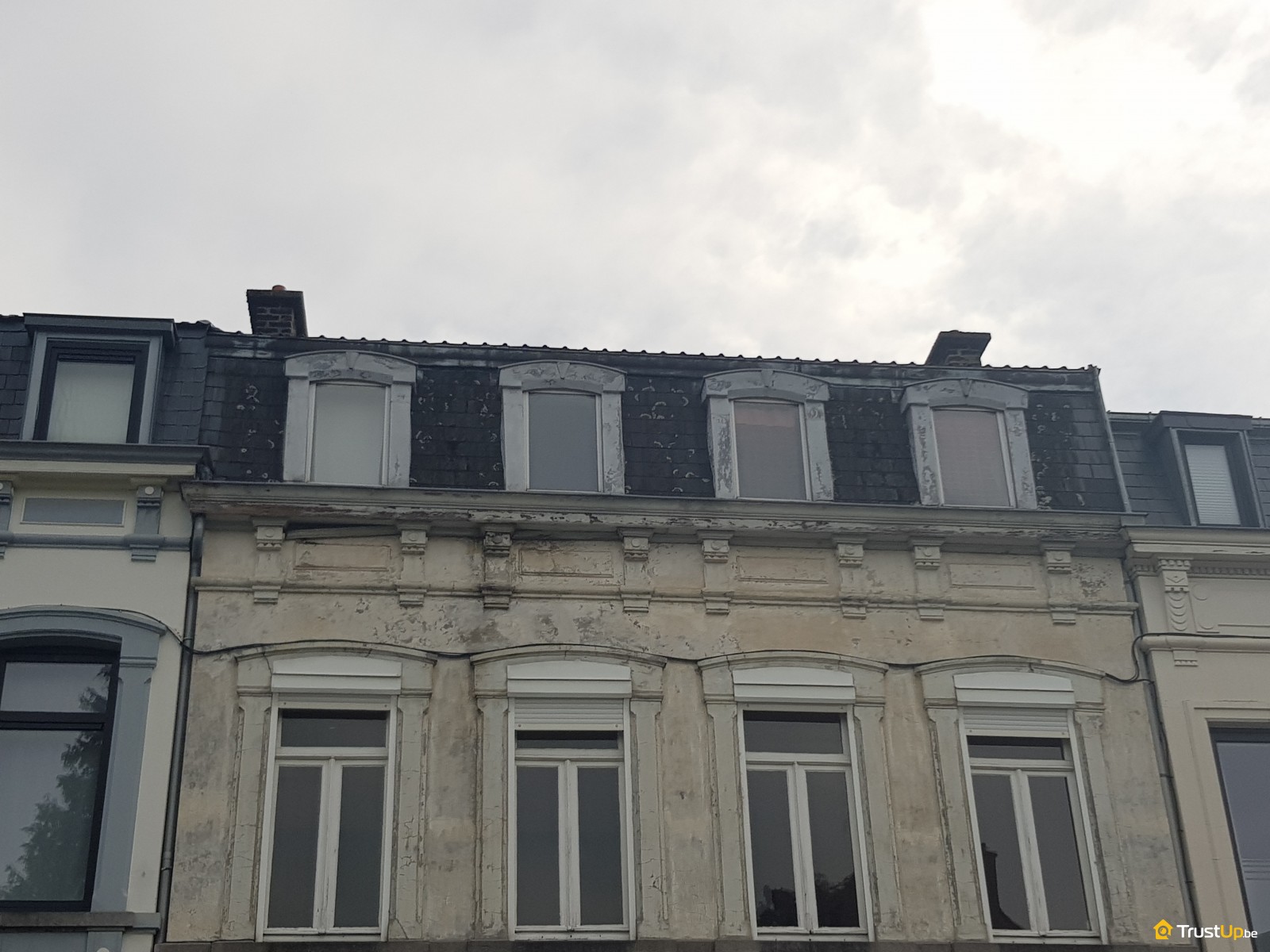 Brisis de toiture en ardoises naturelles avec lucarnes et habillage zinc par ARS Concept